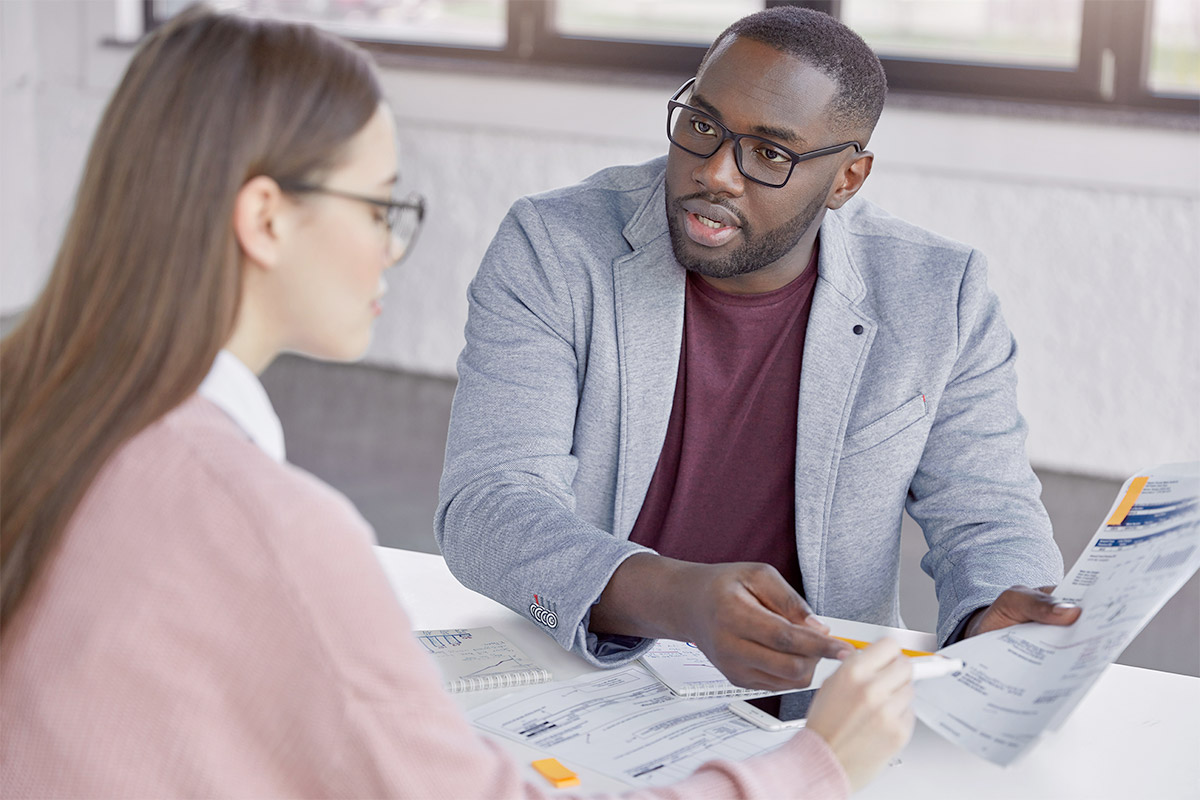 man consulting student
